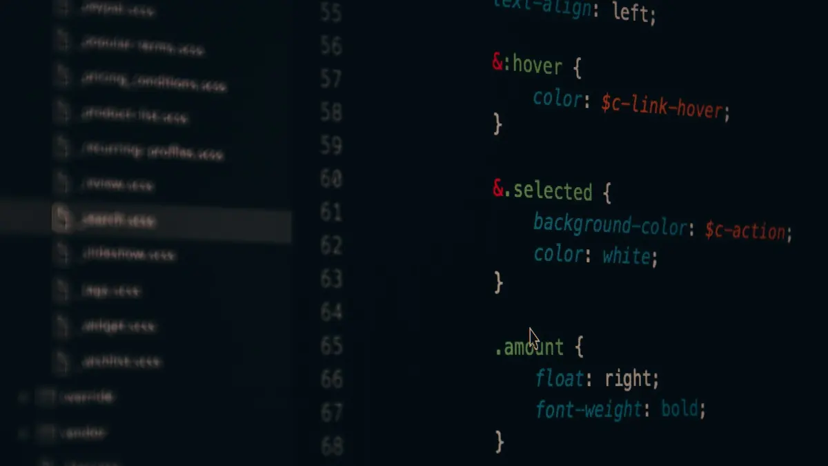 Close-up of colorful CSS code lines on a computer screen for web development.