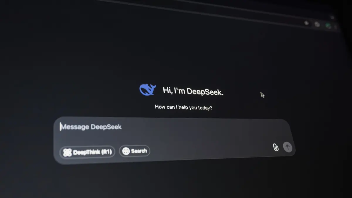 Close-up of a digital assistant interface on a dark screen, showcasing AI technology communication.