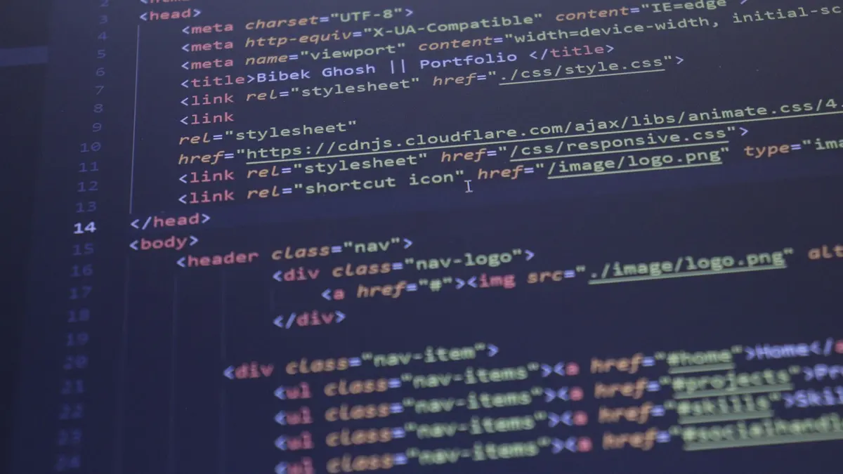 Close-up view of HTML and CSS code displayed on a computer screen, ideal for programming and technology themes.