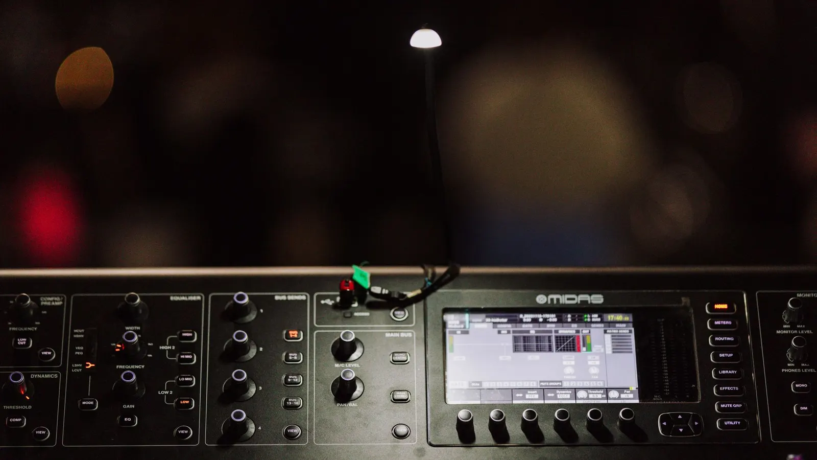 High-quality image of a Midas digital audio mixing console in a studio setting.